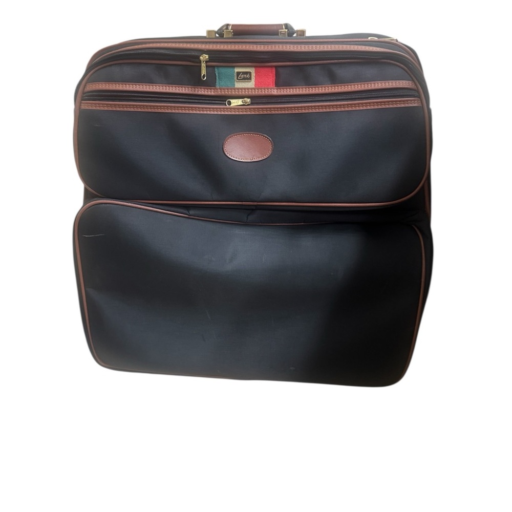 Vintage Samsonite  Lark 2 wheel luggage in Black with classic brown leather trim